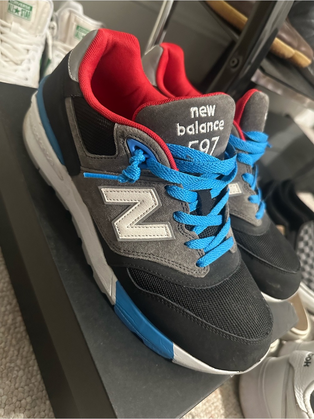 New Balance Gray Black Sneakers with Blue Laces and Red Collar